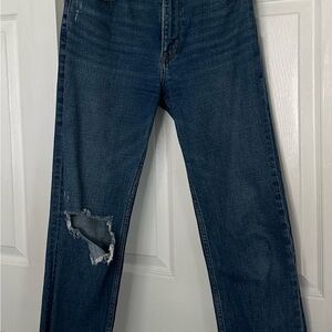 Woman’s Blue Distressed Jeans